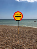 'Stop worrying' lollipop sign