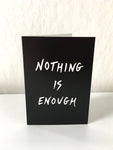 'Nothing is enough' card