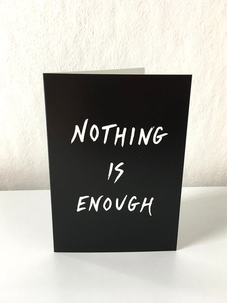 'Nothing is enough' card